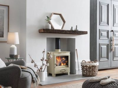 Arada Ecoburn Plus 5 Widescreen wood-burning stove with heat-resistant glass ceramic door panel, fire on.