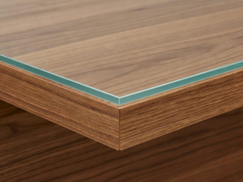 Toughened glass breakfast bar top cut to size, laid flush on a wooden worktop