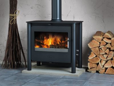ESSE 225 wood-burning stove with heat-resistant glass ceramic door panel, fire on.