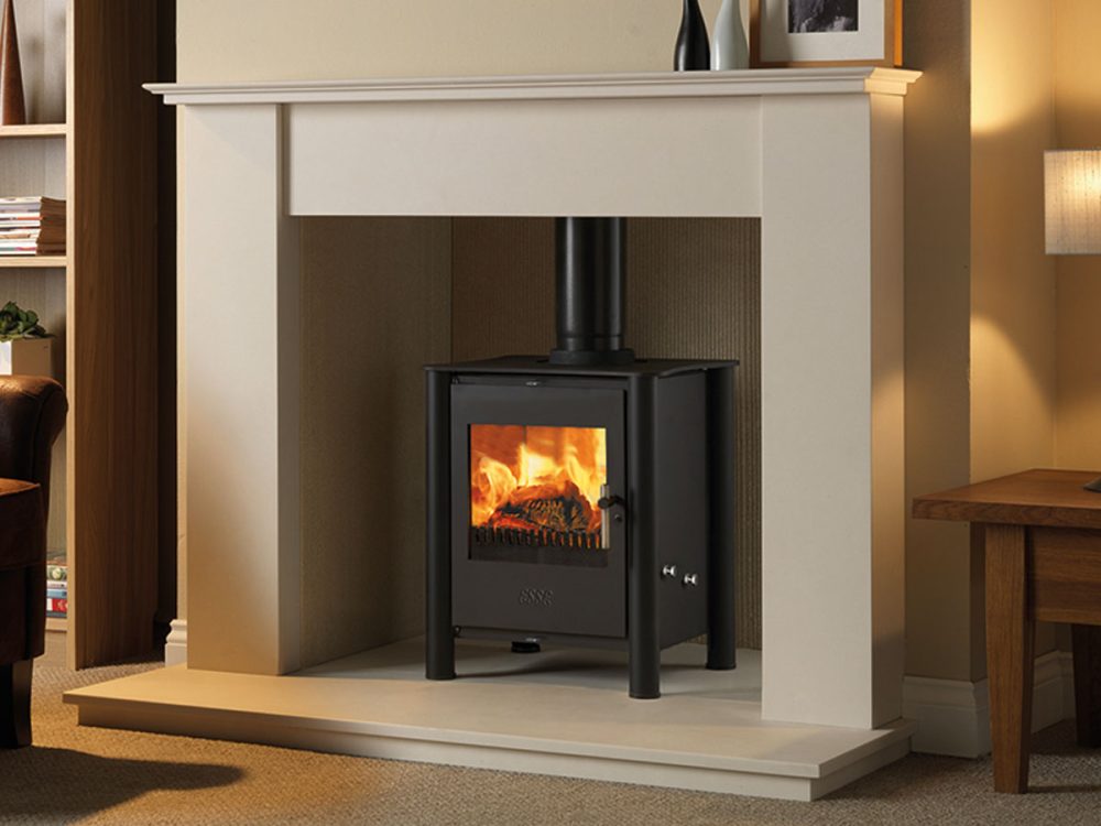 ESSE 525 wood-burning stove with heat-resistant glass ceramic door panel, fire on.