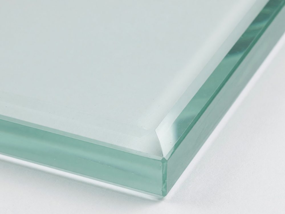 Close up of the polished edge on a clear toughened glass shelf
