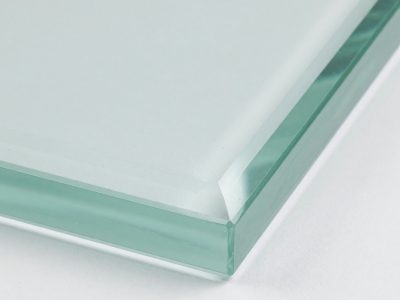 Close up of the polished edge on a clear toughened glass shelf