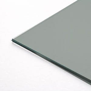 Grey tinted (smoked) toughened glass pane on a white background