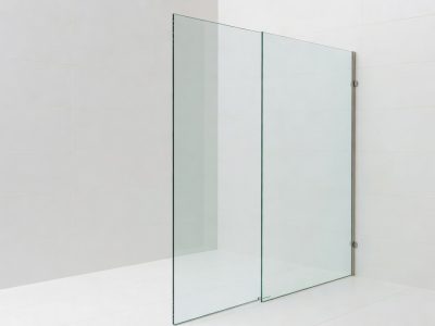 Frameless toughened glass shower screen cut to size with polished exposed top edge